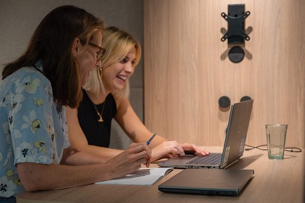 Staff talking with a client online
